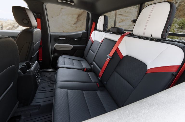 View of GMC Canyon AT4X with Edition 1 package second row interior from driver's side perspective.