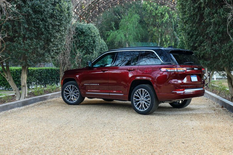 2026 Jeep® Grand Cherokee rear three-quarter view under archway